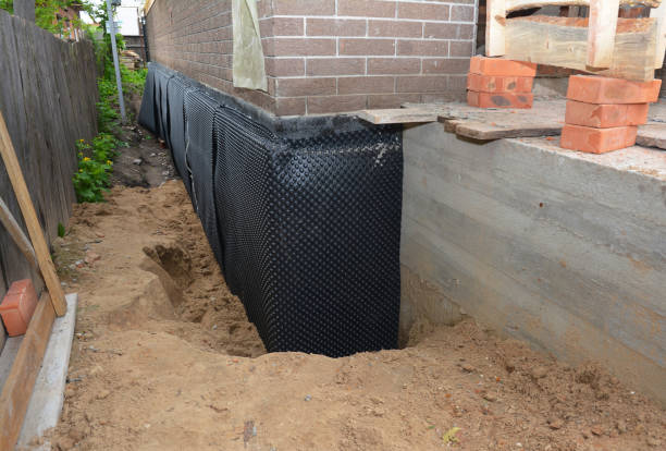 Happy homeowners after waterproofing job in Mechanicsburg
